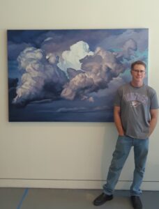 David Holland with oil painting "The Gravity of Souls"